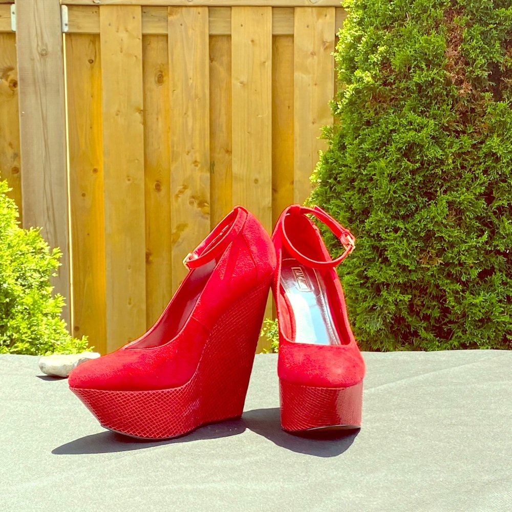 Red Wedged Shoes. Never worn - Sz. 10.